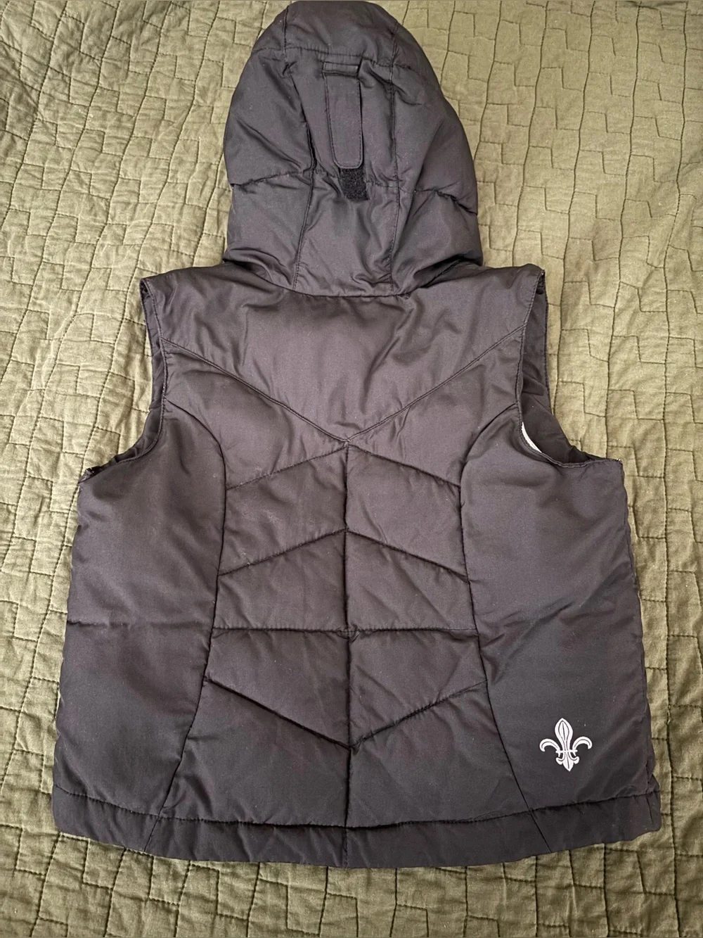 Columbia Kids Black Hooded Vest with Silver Lining and fleur-de-lis.